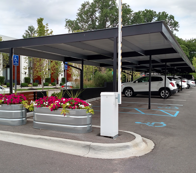commercial carport with 2 white cars in it commercial carport with 2 white cars in it